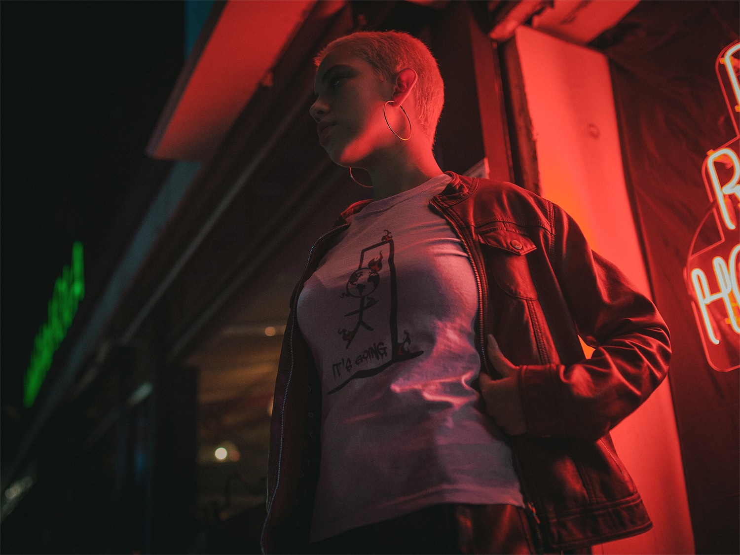 mockup-of-a-woman-wearing-a-round-neck-tee-outside-a-restaurant-at-night-a18911_c1Ec.png